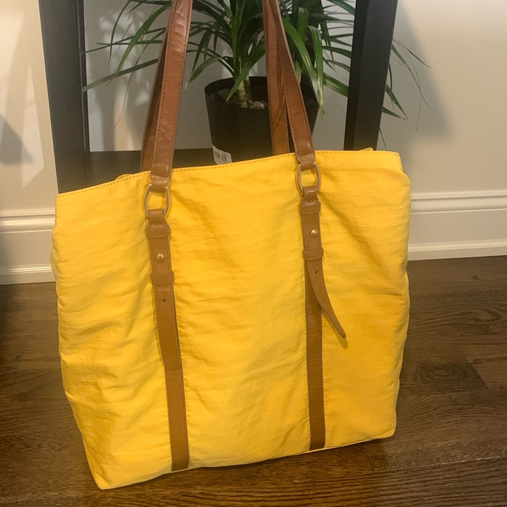 Like new, Banana Republic Tote, 15 in wide and 14 in tall, one mark on bottom